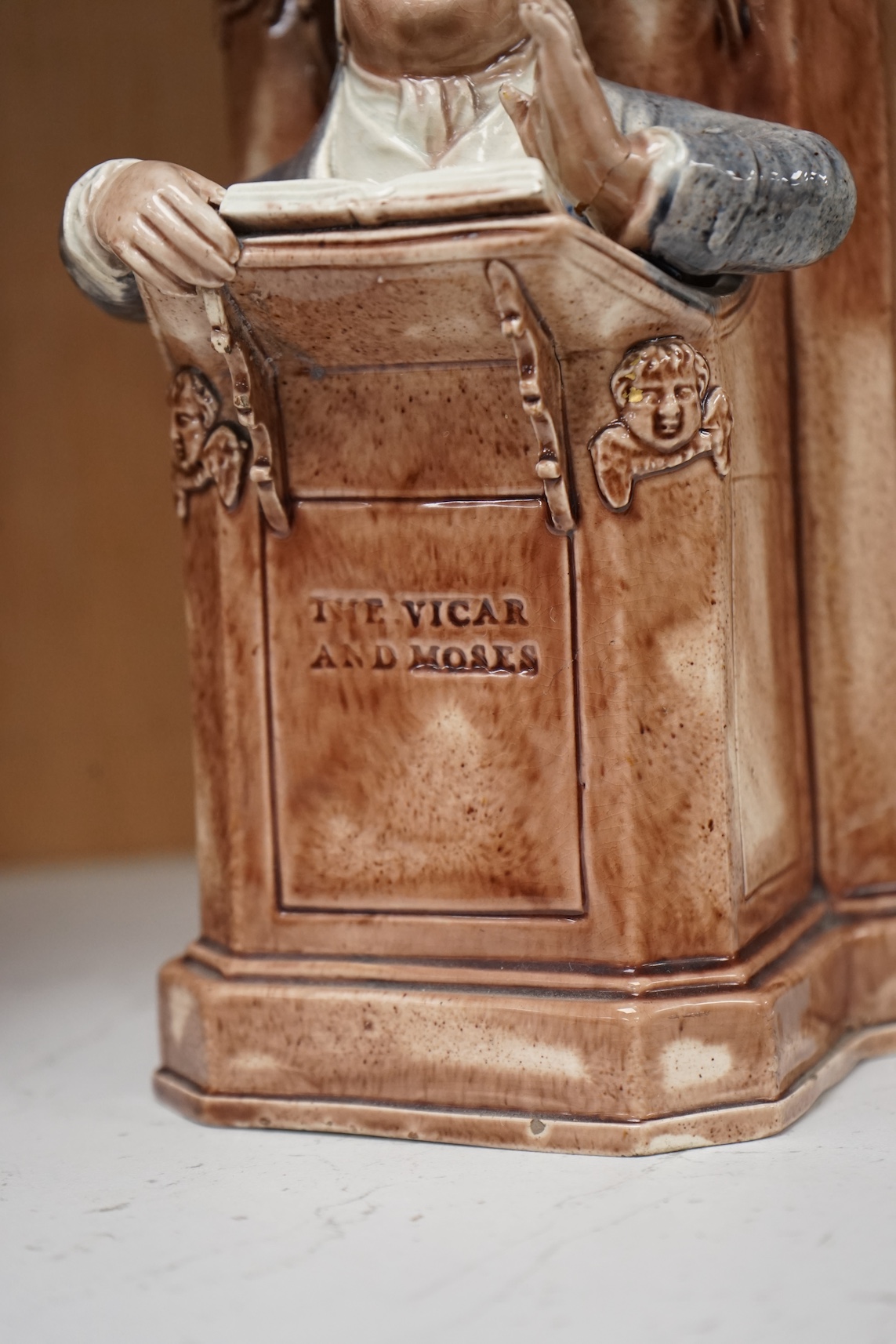 A late 18th century Ralph Wood type creamware Vicar and Moses group, 24cm high. Condition - restored